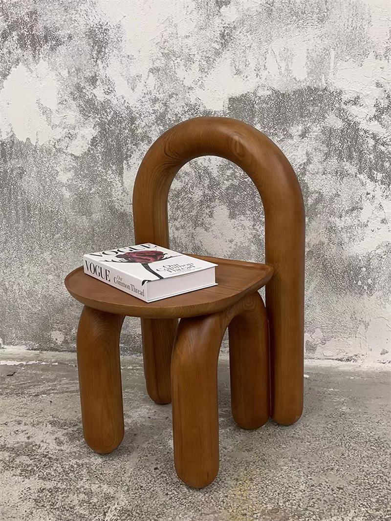 Organic modern hand-carved solid wood chubby arched small chair