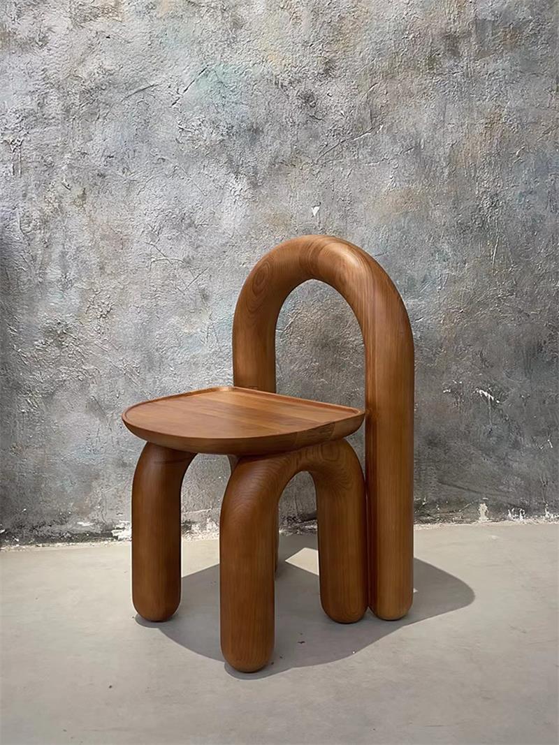 Organic modern hand-carved solid wood chubby arched small chair