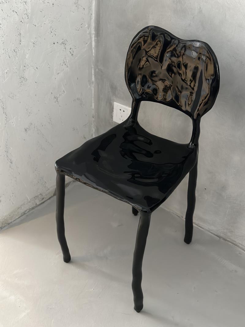 Surrealist minimalist fluid-shaped handmade solid wood melting chair