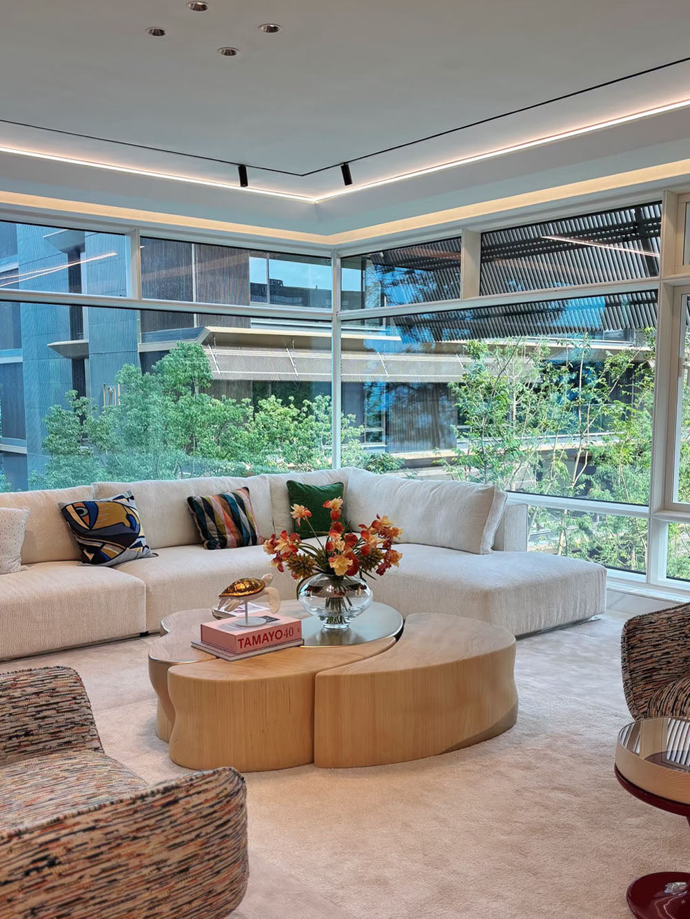 Living room with modern furniture and kitchen