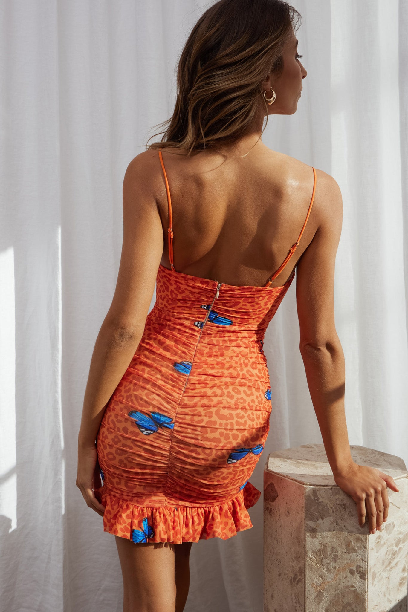 Worth The Wait Ruched Ruffle Hem Mini Dress Butterfly Print Coral-Maymioy