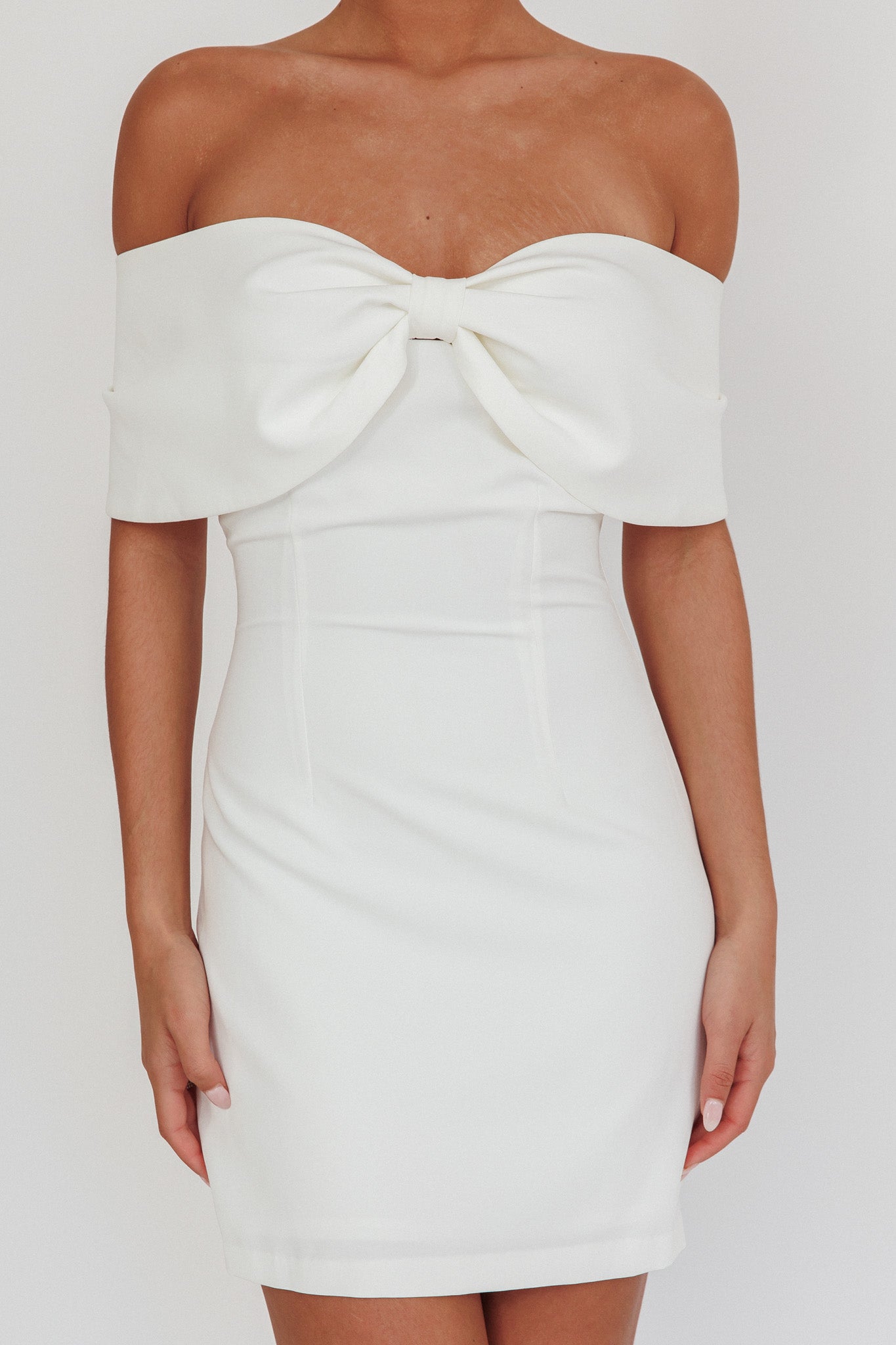 Sweet Caroline Off-Shoulder Bow Mini Dress White-Maymioy