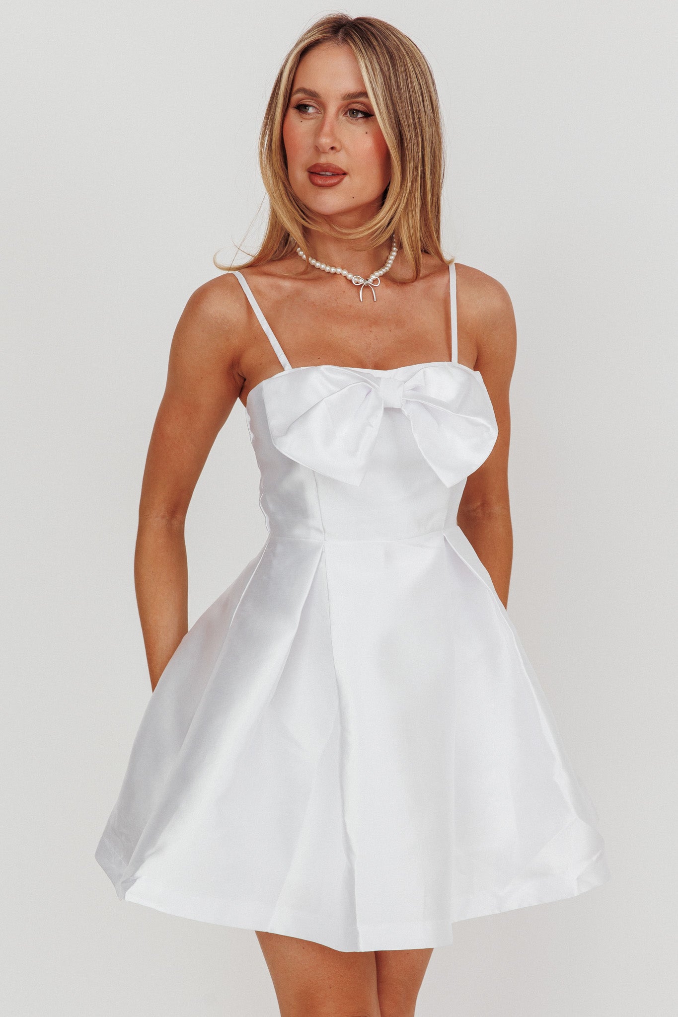 Love Talk Flared Bow Mini Dress White-Maymioy