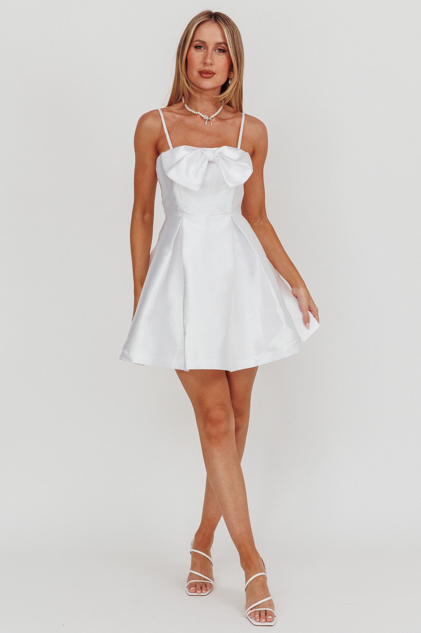 Love Talk Flared Bow Mini Dress White-Maymioy