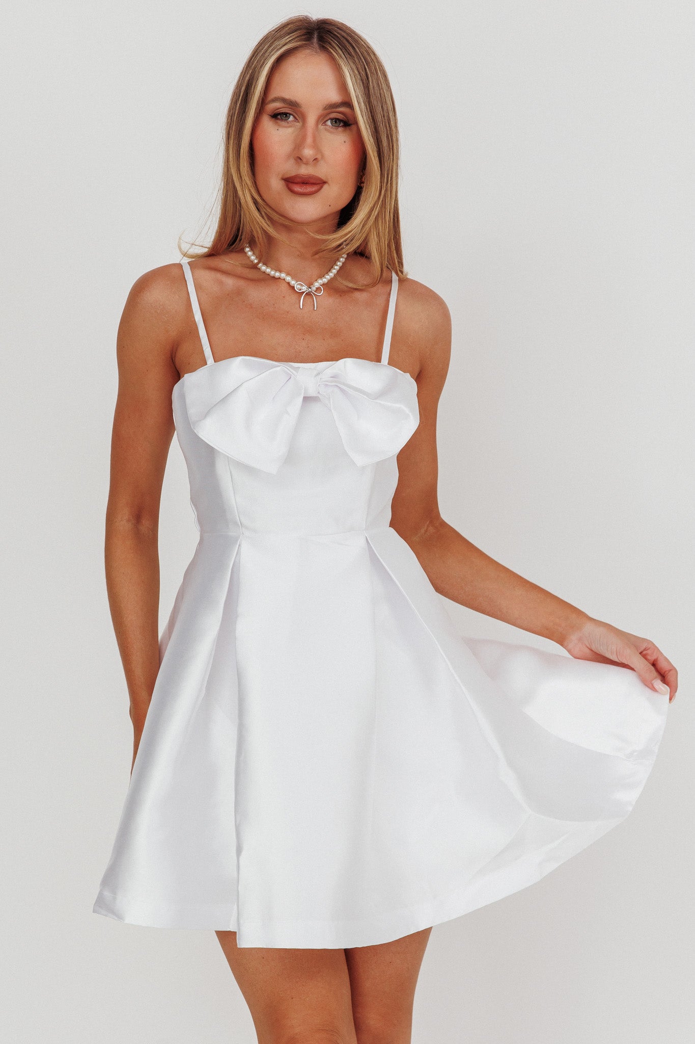 Love Talk Flared Bow Mini Dress White-Maymioy
