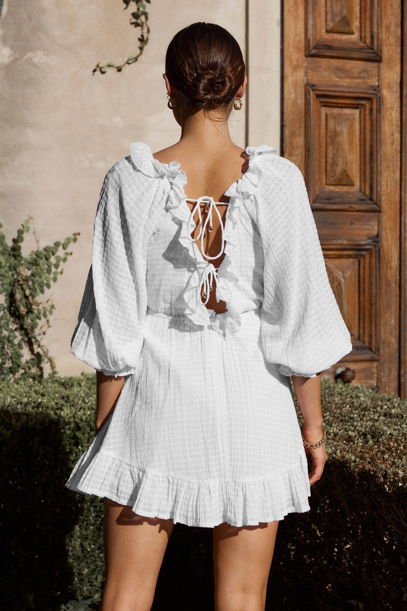 Hooked On A Feeling Long Sleeve String Tie Back Mini Dress White-Maymioy