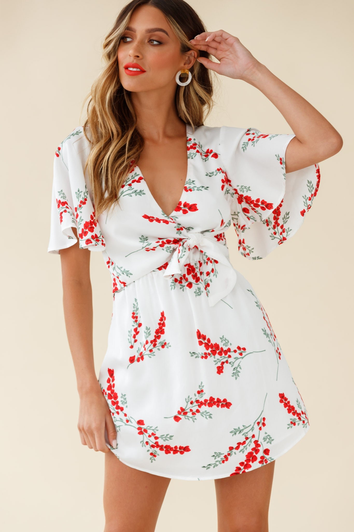 Stealing Hearts Flutter Sleeve Wrap Front Dress Floral Print White-Maymioy