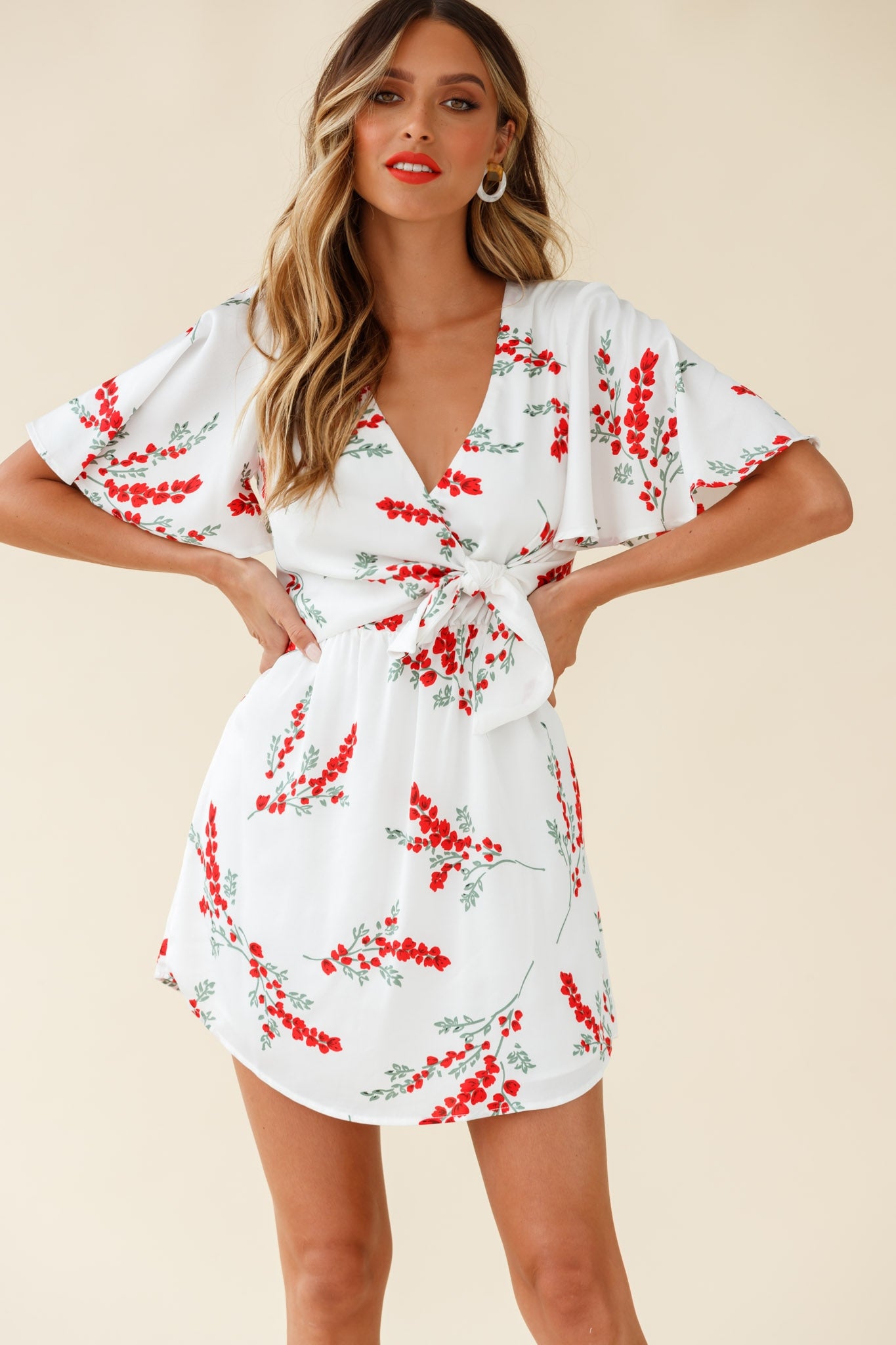 Stealing Hearts Flutter Sleeve Wrap Front Dress Floral Print White-Maymioy
