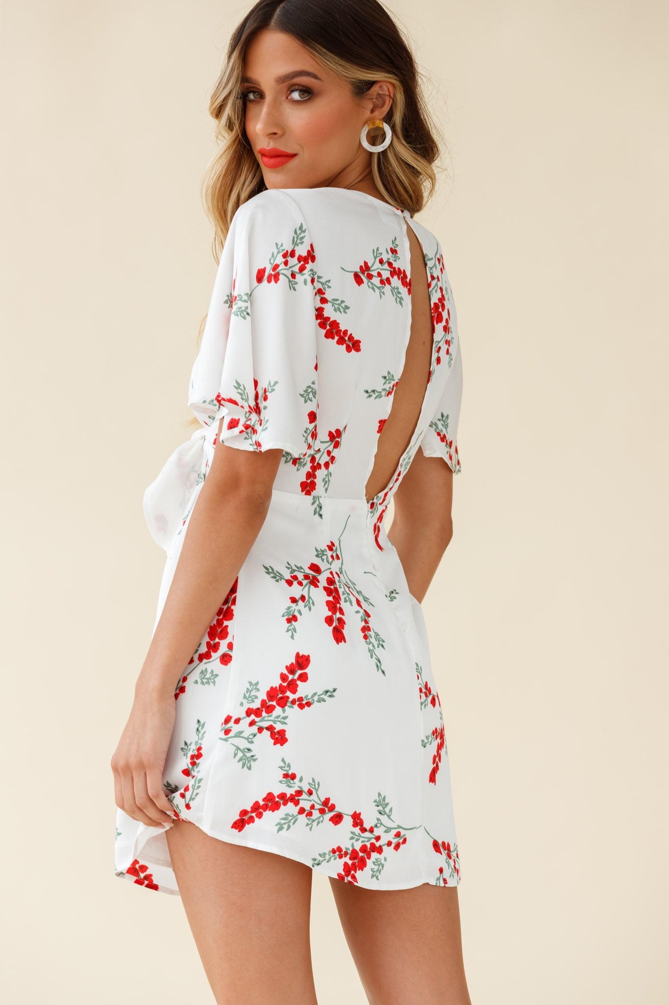 Stealing Hearts Flutter Sleeve Wrap Front Dress Floral Print White-Maymioy