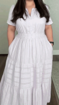 Women wearing elegant V-neck pleated long dress in summer