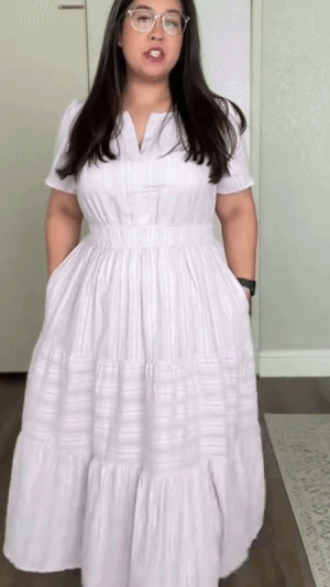 Women wearing elegant V-neck pleated long dress in summer