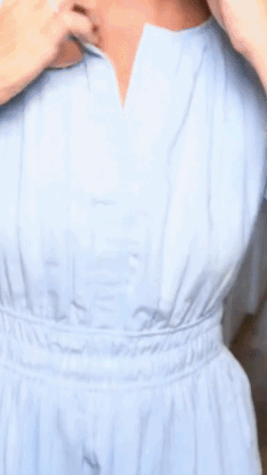 Women wearing elegant V-neck pleated long dress in summer
