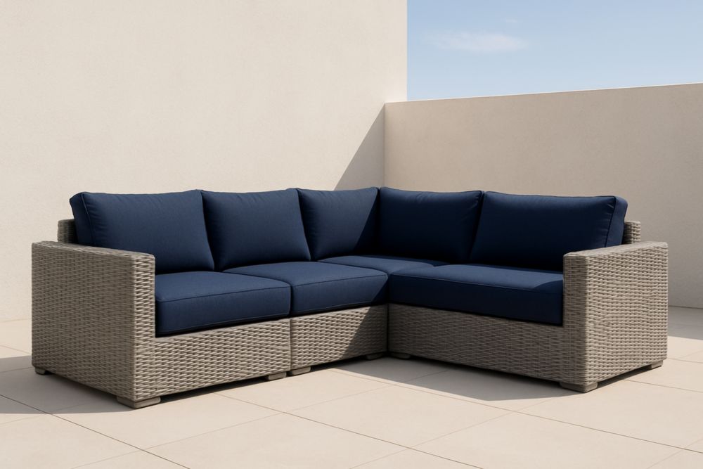Divano ad angolo modulare in rattan sintetico grigio con cuscini blu per esterni 210x75x65 cm
