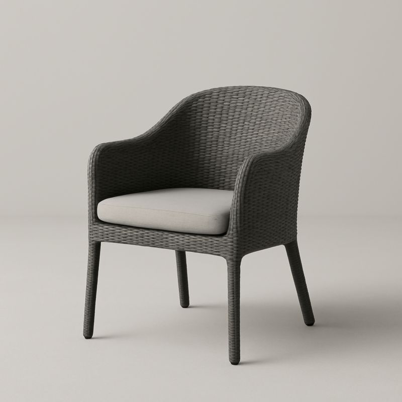 Poltrona in rattan PE grigio con cuscino in tessuto beige