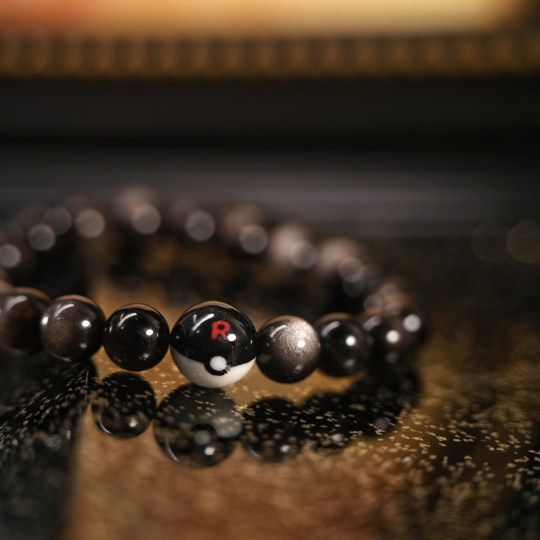 Team Rocket Ball Bracelet – Handmade Ceramic + Silver Obsidian
