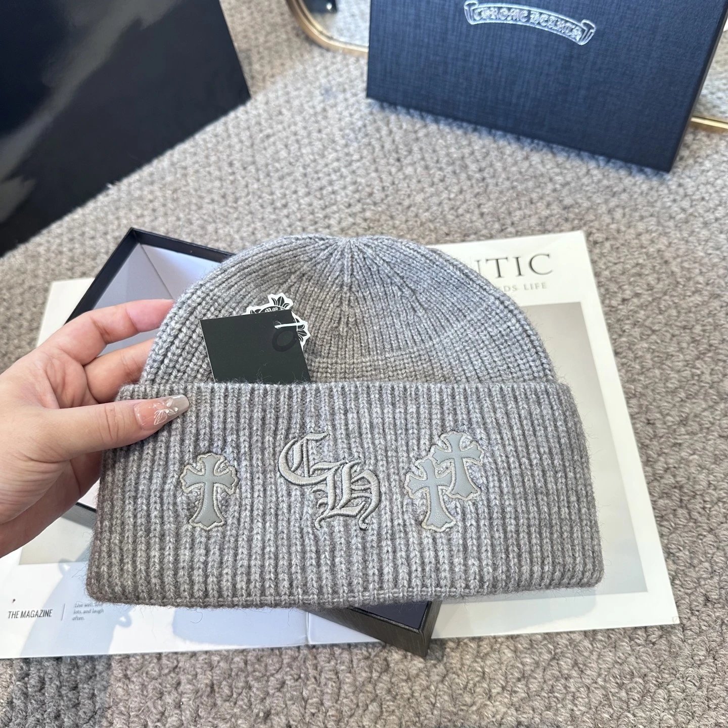 High quality cross autumn and winter knitted hat with yarn