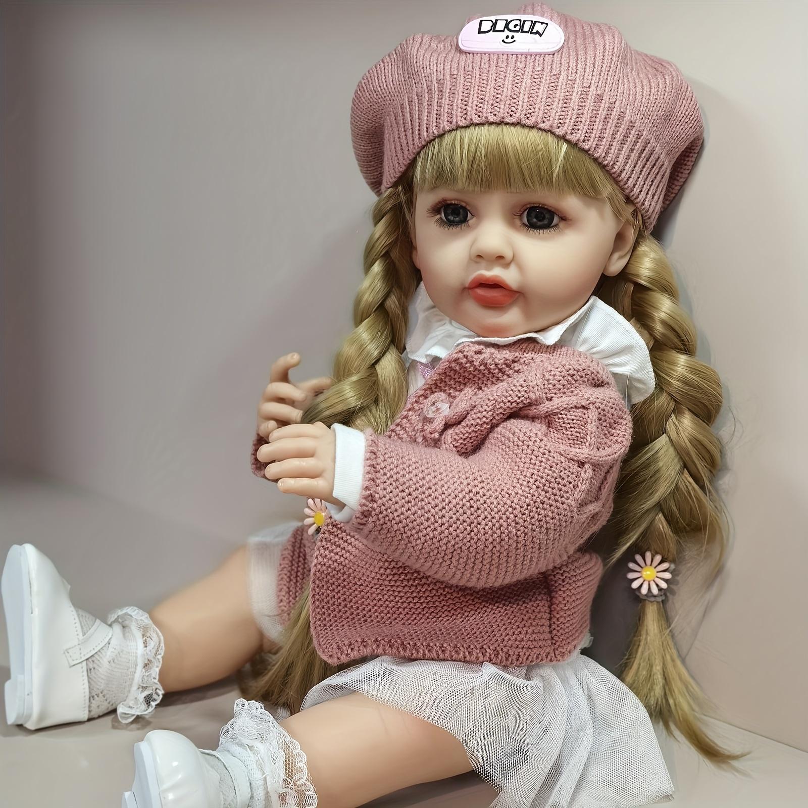 KEIUMI Reborn Baby Dolls- Birthday and Christmas Gift for Kids,22 inch Full Body Silicone Baby Girl-Betty with 2Golden Braids,BlueEyes,White Peter Pan Collar Dress,Dusty PinkCardigan,BeretHat,LaceSocks,LeatherShoes 2 Pink Daisy Hair Ties,Gift for Girls 3+