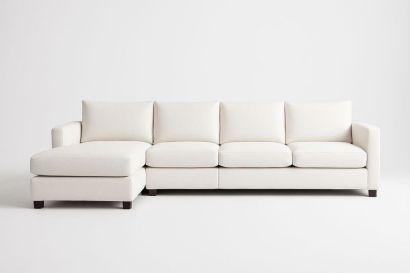 Divano angolare in tessuto bianco con chaise longue