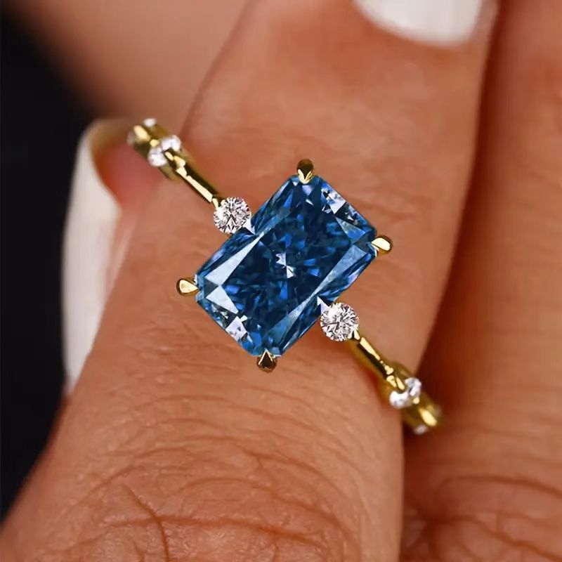 A ring adorned with dazzling cut colored gemstones