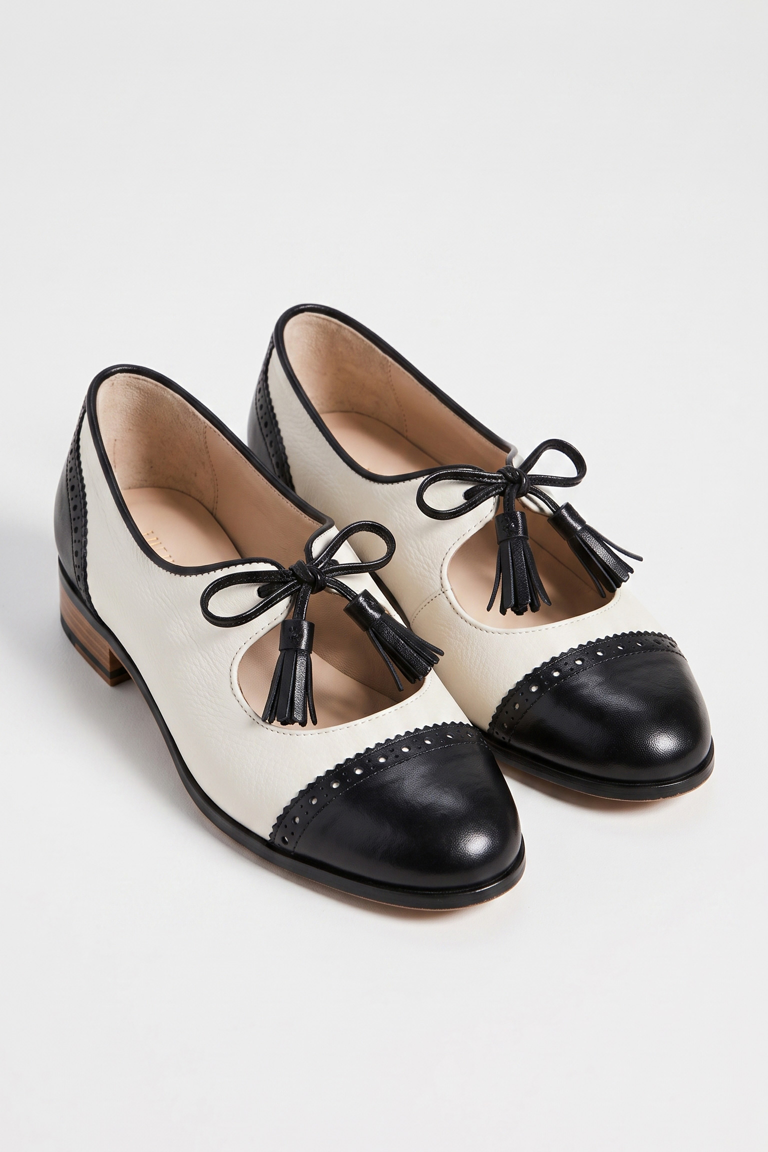 Textured Leather Perforated Tasseled Mary Jane Flats