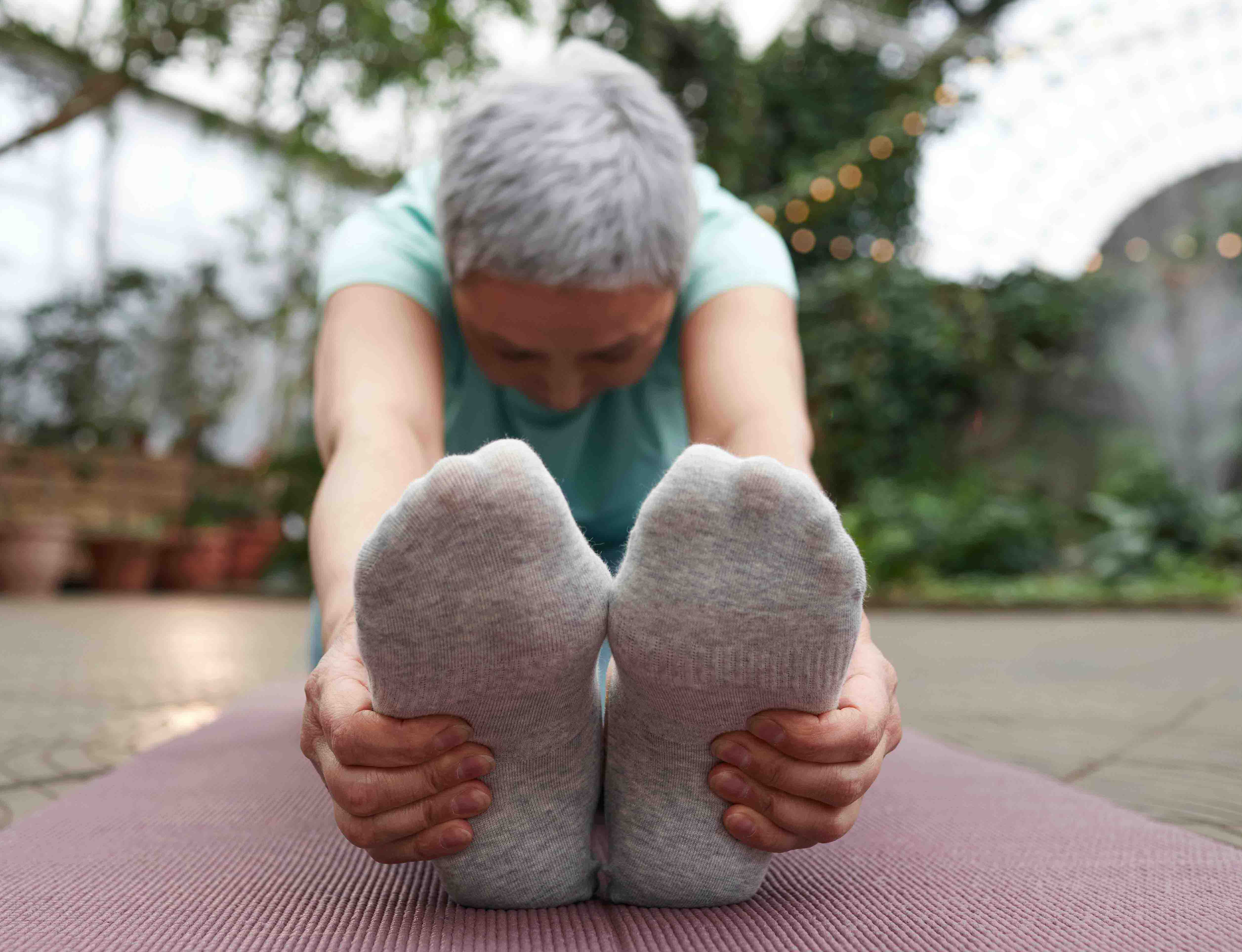 Photo by Mikhail Nilov: https://www.pexels.com/photo/an-elderly-man-raising-his-leg-7530002/