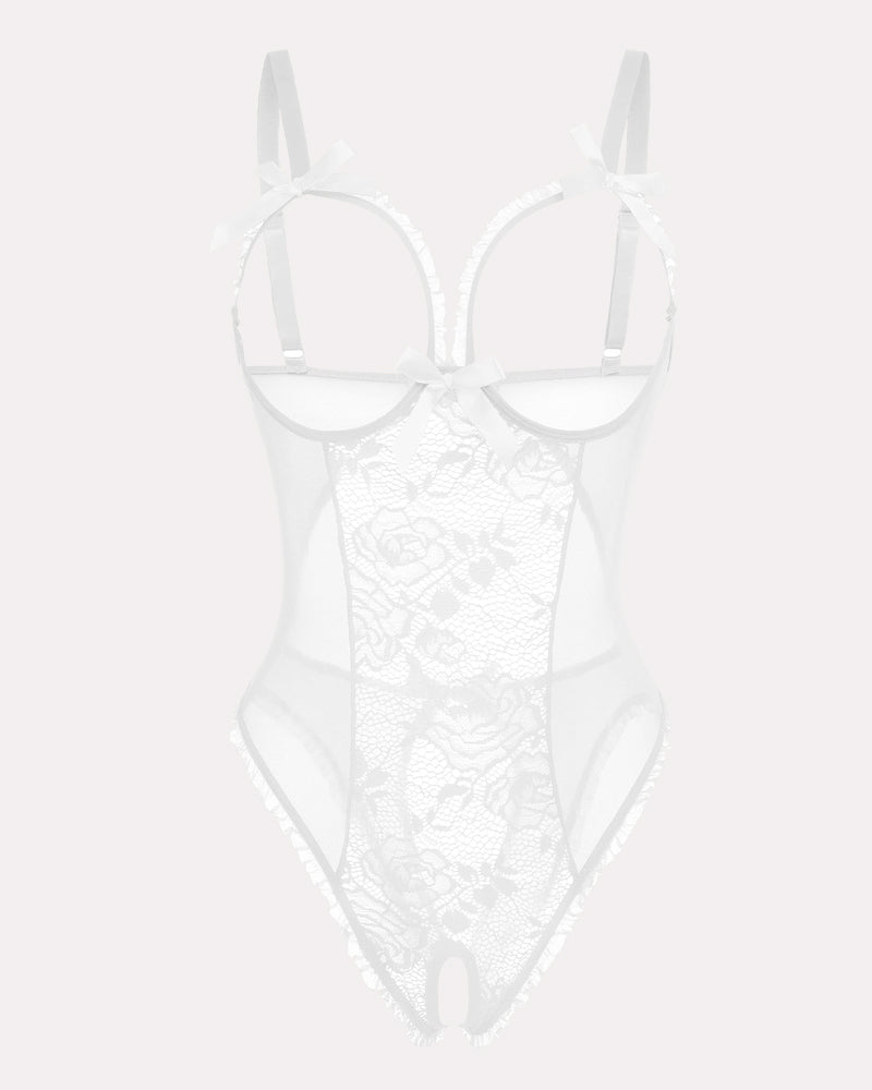 Crotchless white lace bodysuit with cutout bra, floral lace, ruffle trim, and adjustable straps.
