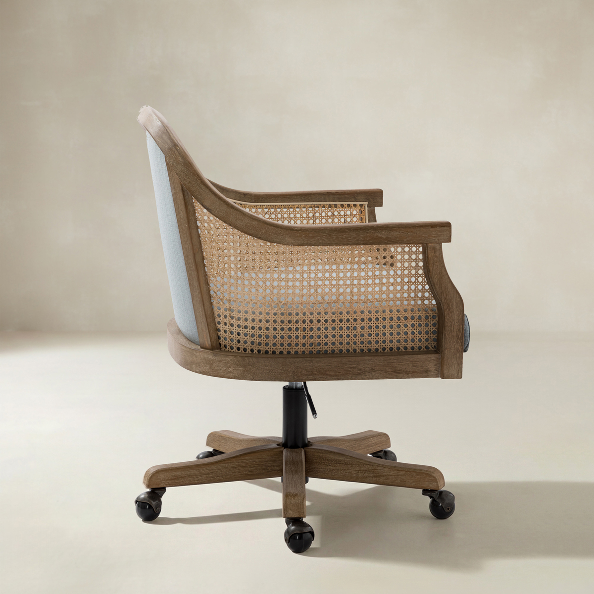 Audrey Rattan Task Chair Swivel Base & Curved Seat Design