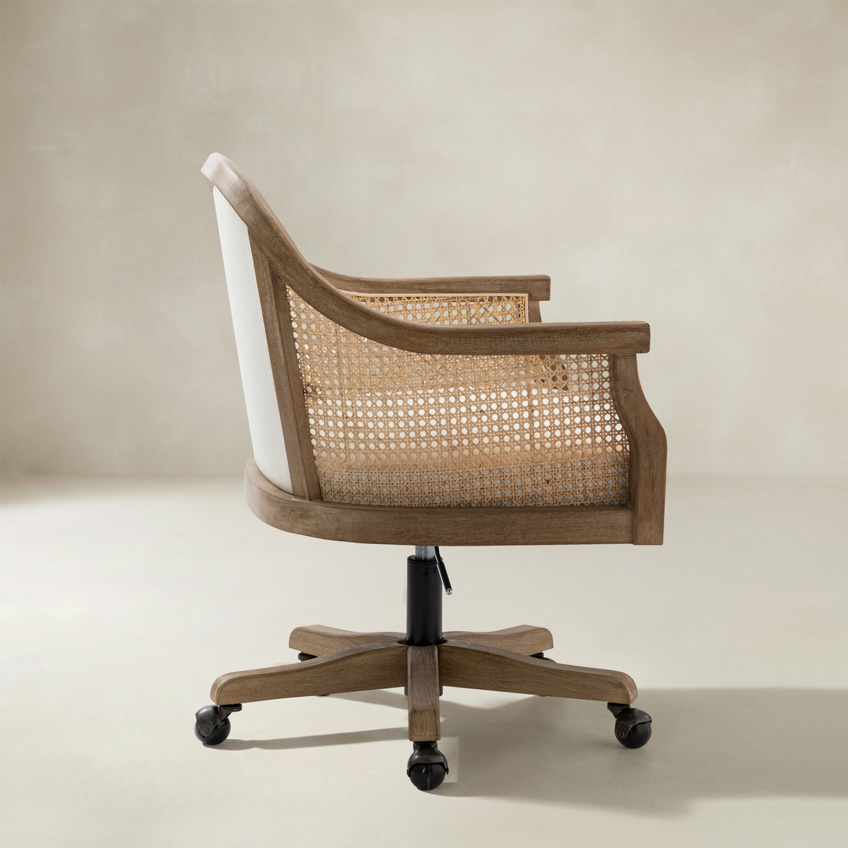 Audrey Rattan Task Chair Swivel Base & Curved Seat Design
