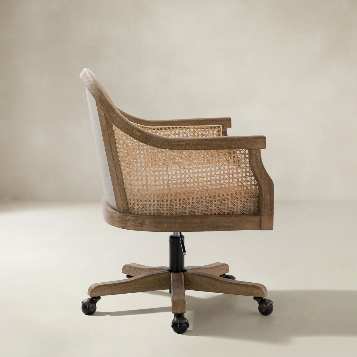 Audrey Rattan Task Chair Swivel Base & Curved Seat Design