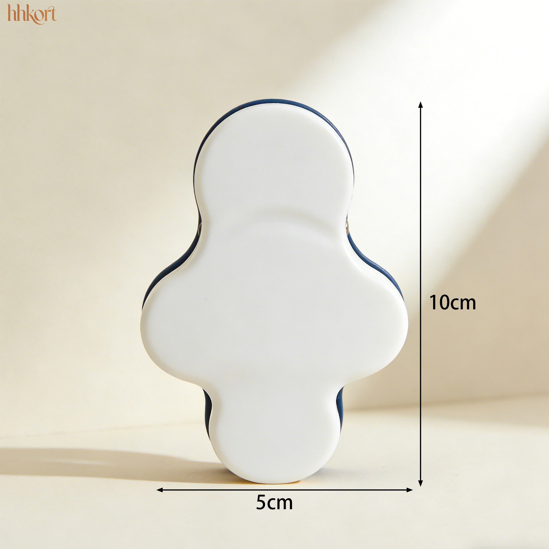 Close-up of sheet fastener attached to mattress