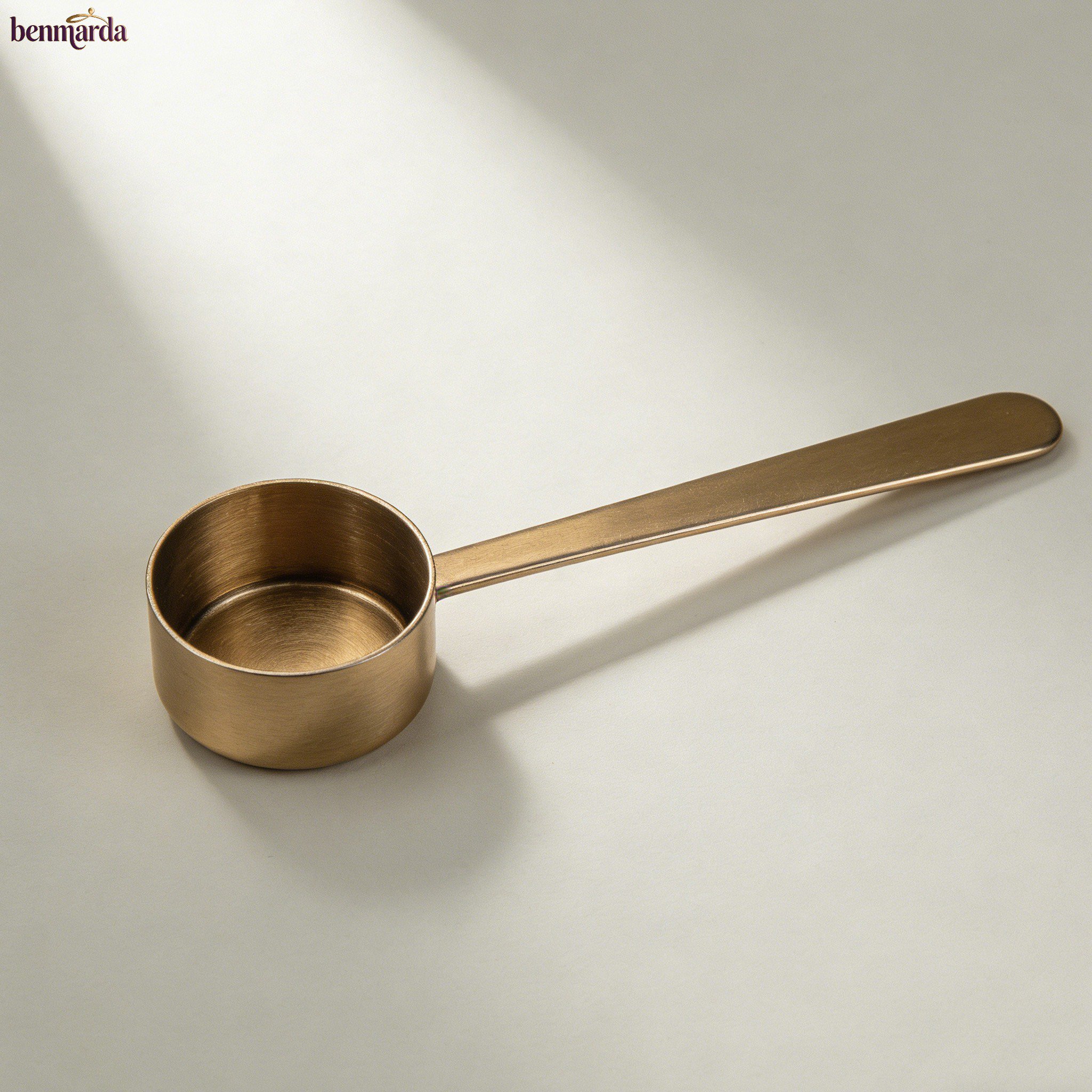 Set of 10 coffee measuring spoons arranged neatly