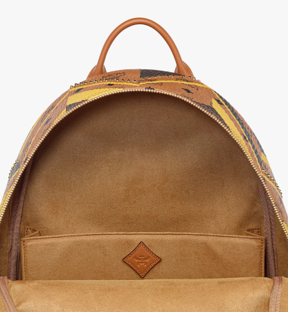 Studded Stark Backpack in Mega Herringbone Visetos（Medium）