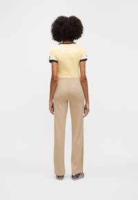 adidas OriginalsSTRAIGHT PANTS - Jogginghose