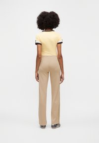 adidas OriginalsSTRAIGHT PANTS - Jogginghose