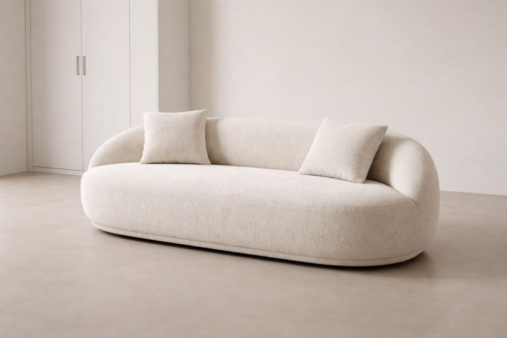 Canapé trois places en tissu bouclé Crème