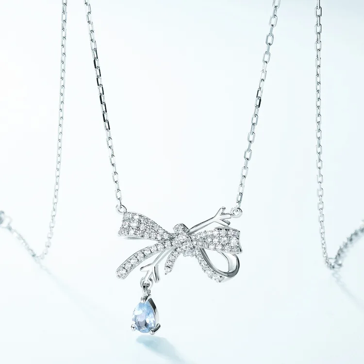 JewelyKing S925 Sterling Silver Cubic Zircon Bowknot Chain Pear Pendant Blue Topaz Necklace JKNS0138