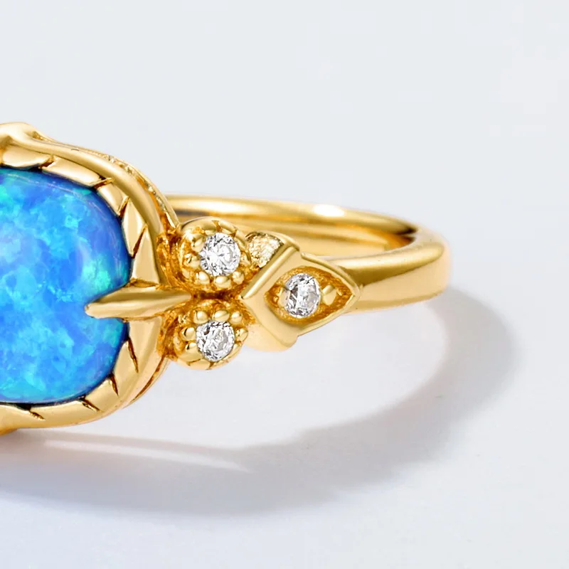 JewelyKing S925 Sterling Silver Vintage 18K Gold Plated Ring Synthetic Blue Opal Ring JKRS0267
