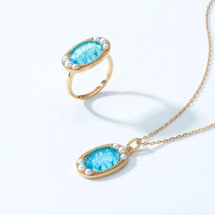 JewelyKing S925 Sterling Silver Vintage Ladies Gold Plated Synthetic Blue Crystal Pendant JKNS0189