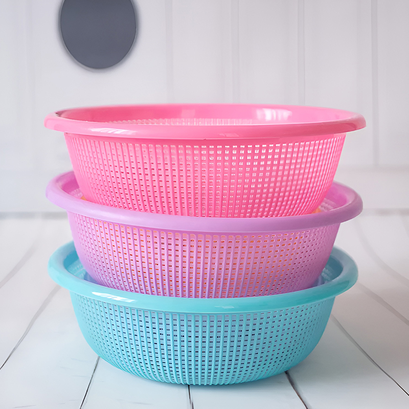 Canasta redonda de frutas y verduras