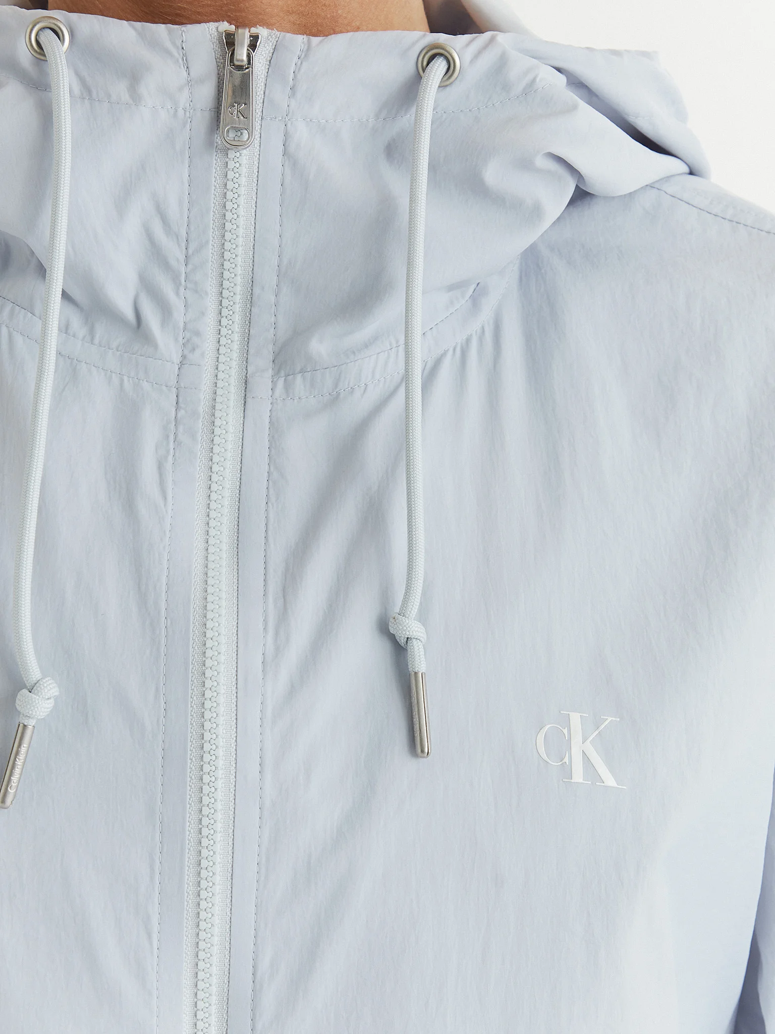 Calvin Klein Sötétfekete Kapucnis Kabát – Minőség és Stílus minden napra!