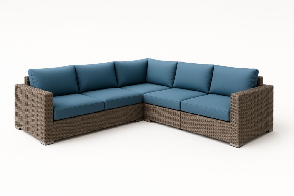 Divano ad angolo in rattan sintetico con cuscini blu