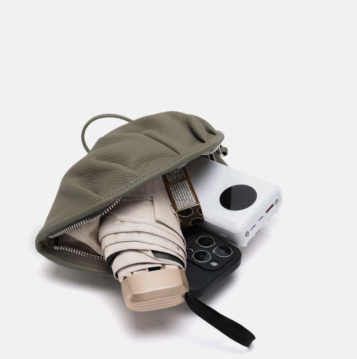Niche relaxed style genuine leather handheld bag — a refined, portable handbag with large capacity for makeup