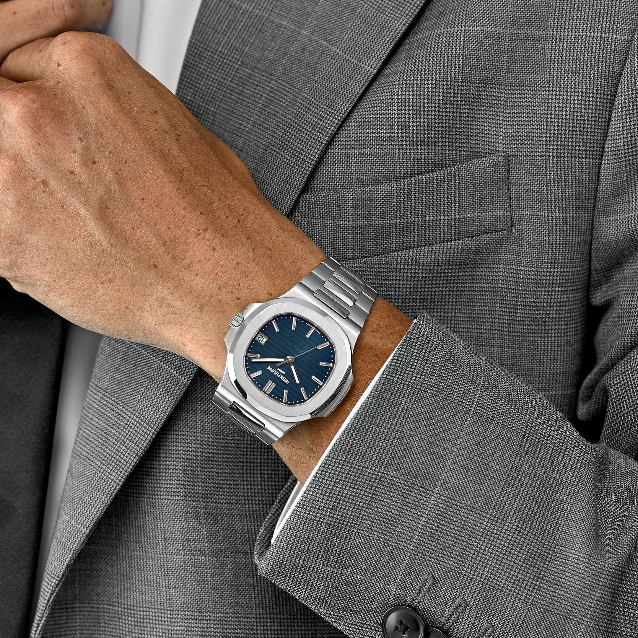 Patek Philippe Nautilus 5711/1P-001 40th Anniversary Platinum Blue Diamond Baguette Dial Limited Edition
