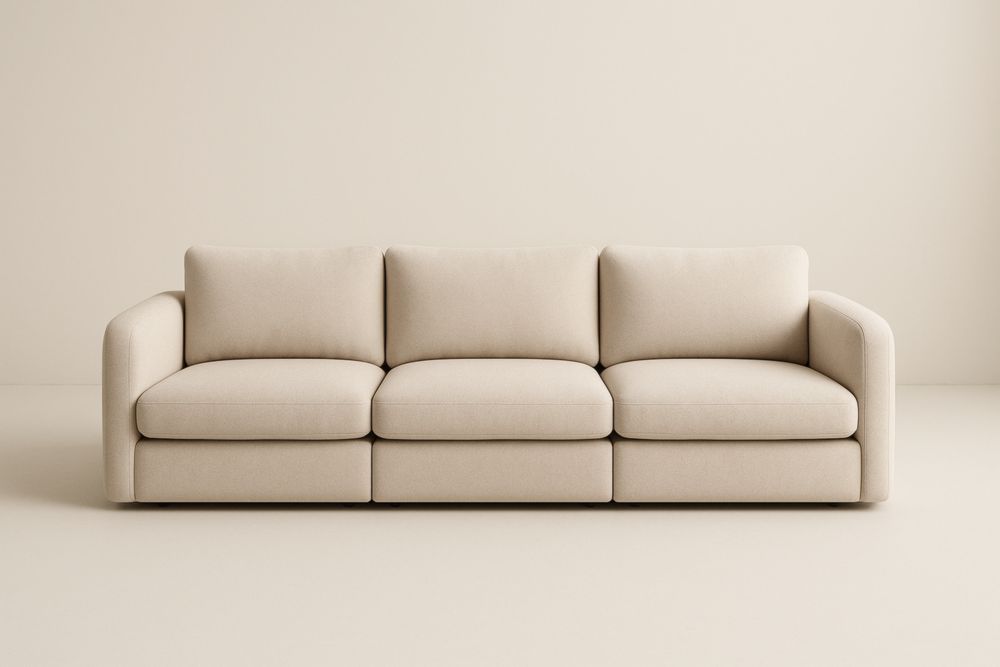 Canapé long 3 places en tissu polyester beige avec accoudoirs rembourrés