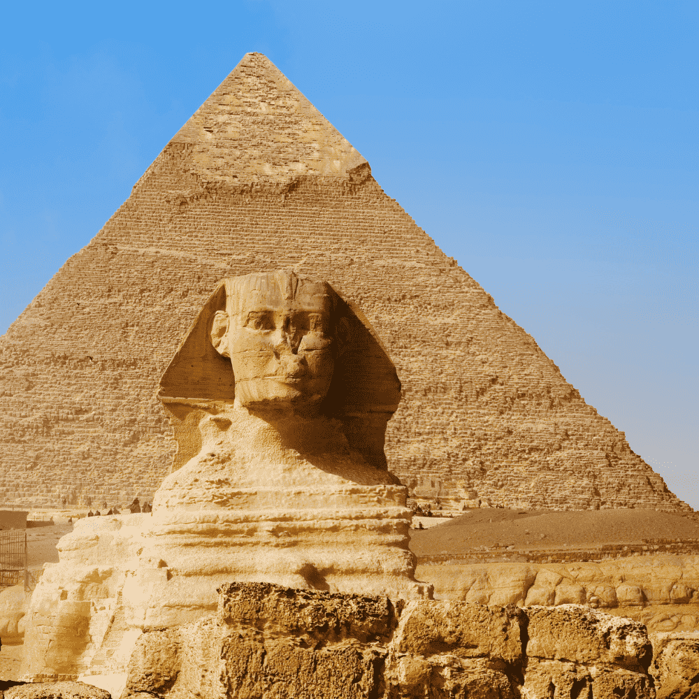 Egypt eSIM – Great Sphinx of Giza with the Great Pyramid rising behind it under a clear blue sky, travel eSIM for Egypt
