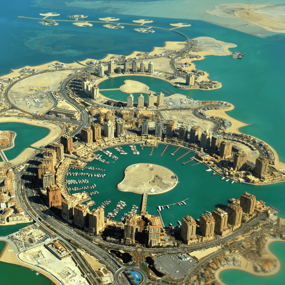Qatar eSIM – Aerial view of The Pearl-Qatar luxury island development in Doha, travel eSIM for Qatar
