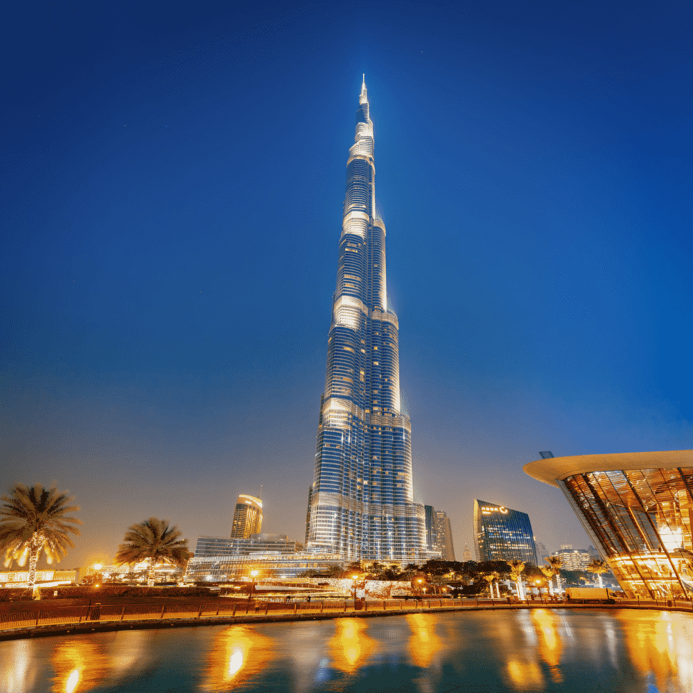 United Arab Emirates eSIM – Burj Khalifa tower illuminated at twilight with water reflections in Dubai, travel eSIM for UAE
