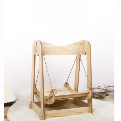 Drewniane łóżko bujane dla kotów