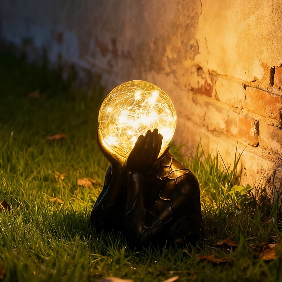 Solar-Powered Resin Figurine Holding Light Ball Outdoor Decor