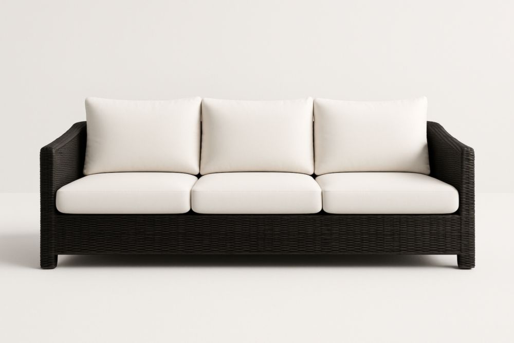 Canapé d'extérieur en résine tressée noir et coussins en tissu blanc